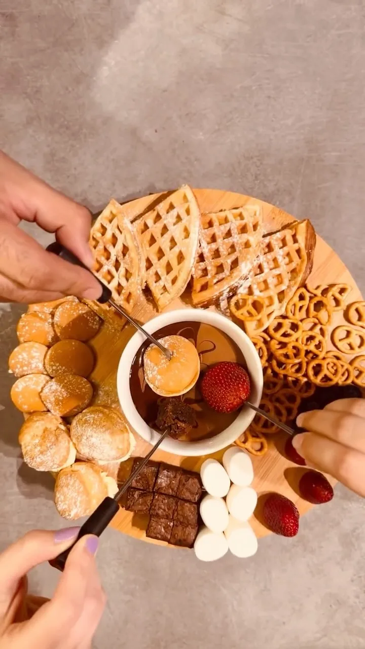 The Chafé Fondue Board from above: waffles, brownies, profiteroles, fruit