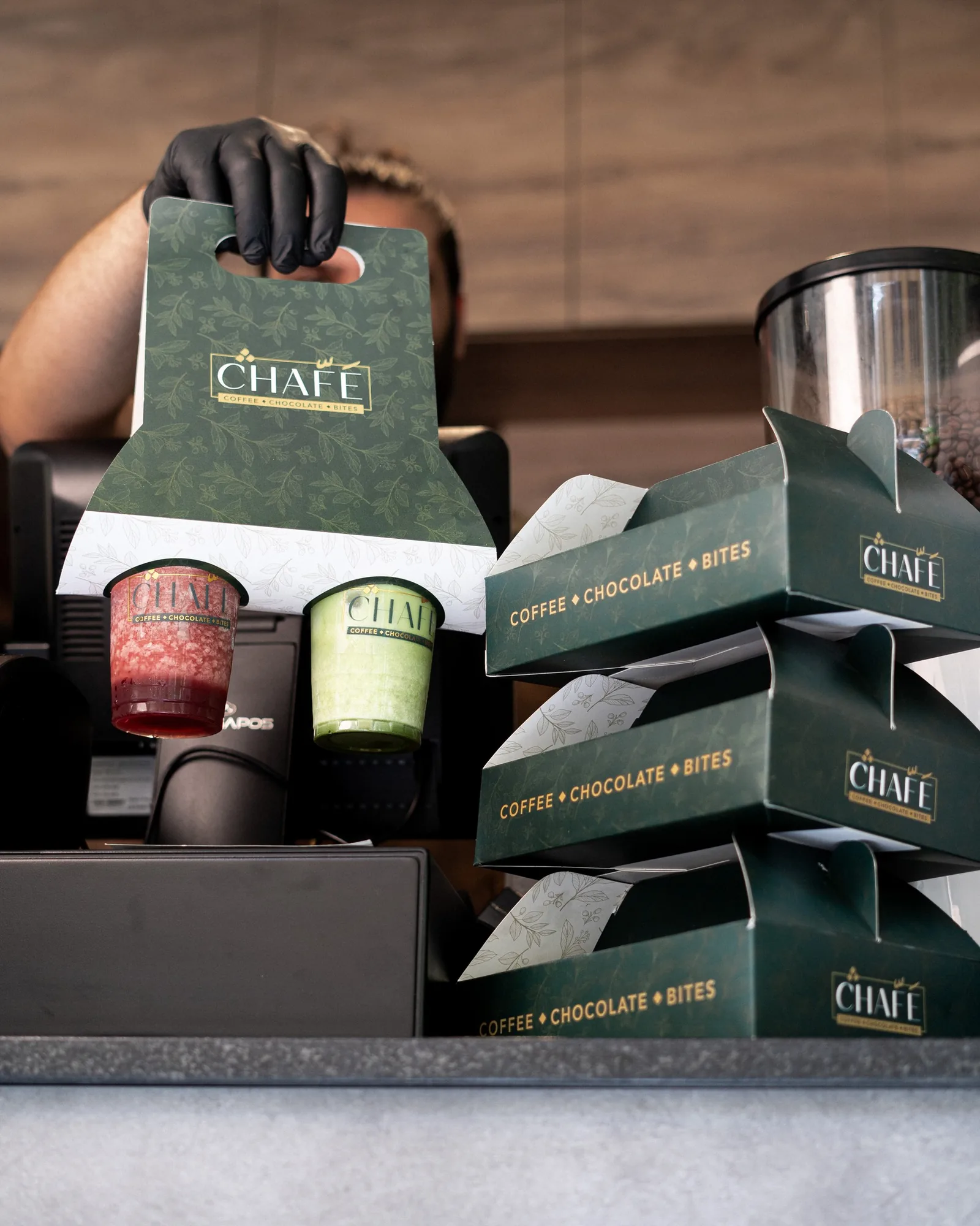CHAFÉ green boxes and cans ready to go